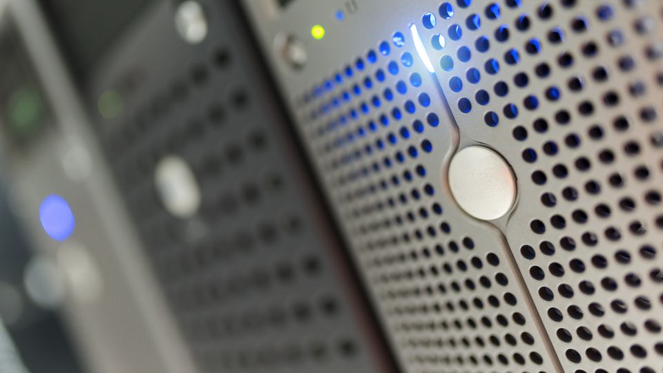 Close-up of server rack with blue indicators