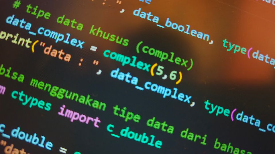 Computer screen with colorful code and data