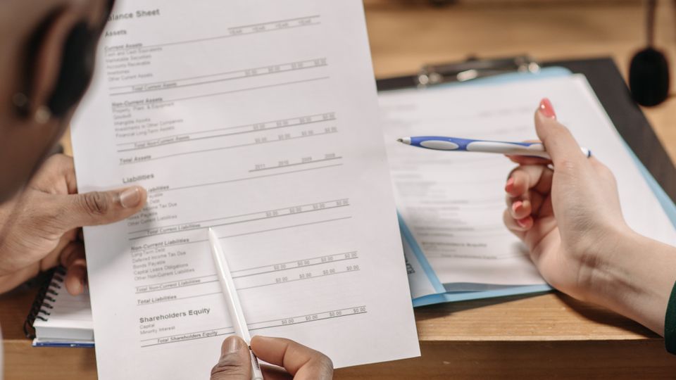Professionals reviewing financial documents