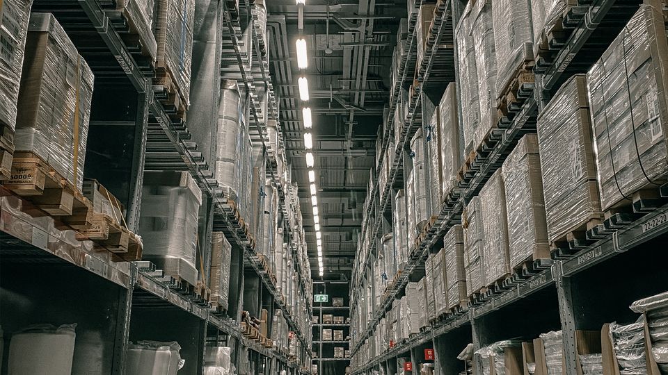 Large warehouse aisle representing marketplace operations