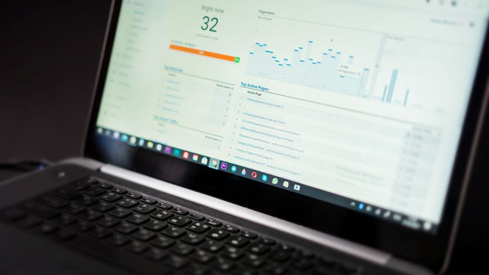 Laptop displaying analytics dashboard for SEO monitoring