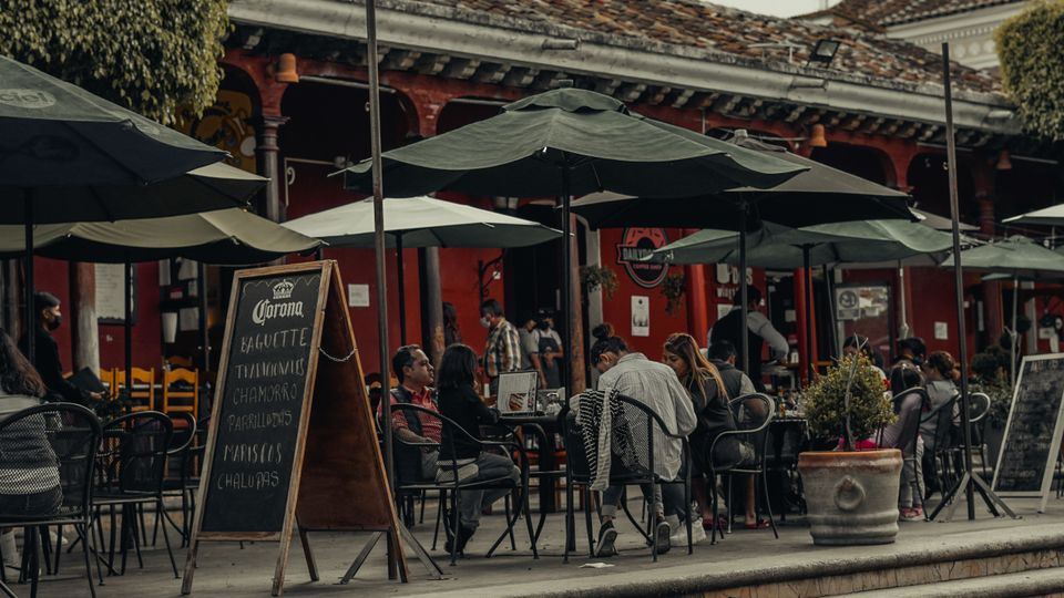 Busy outdoor restaurant and hospitality scene